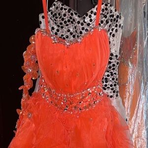 Orange prom dress w/shoulder strap & bling on top of dress & some on bottom